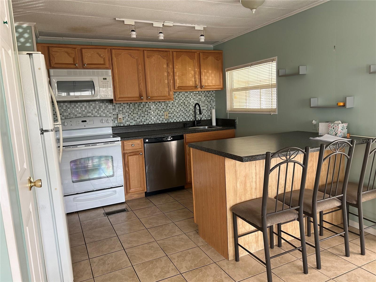 Updated kitchen with breakfast bar