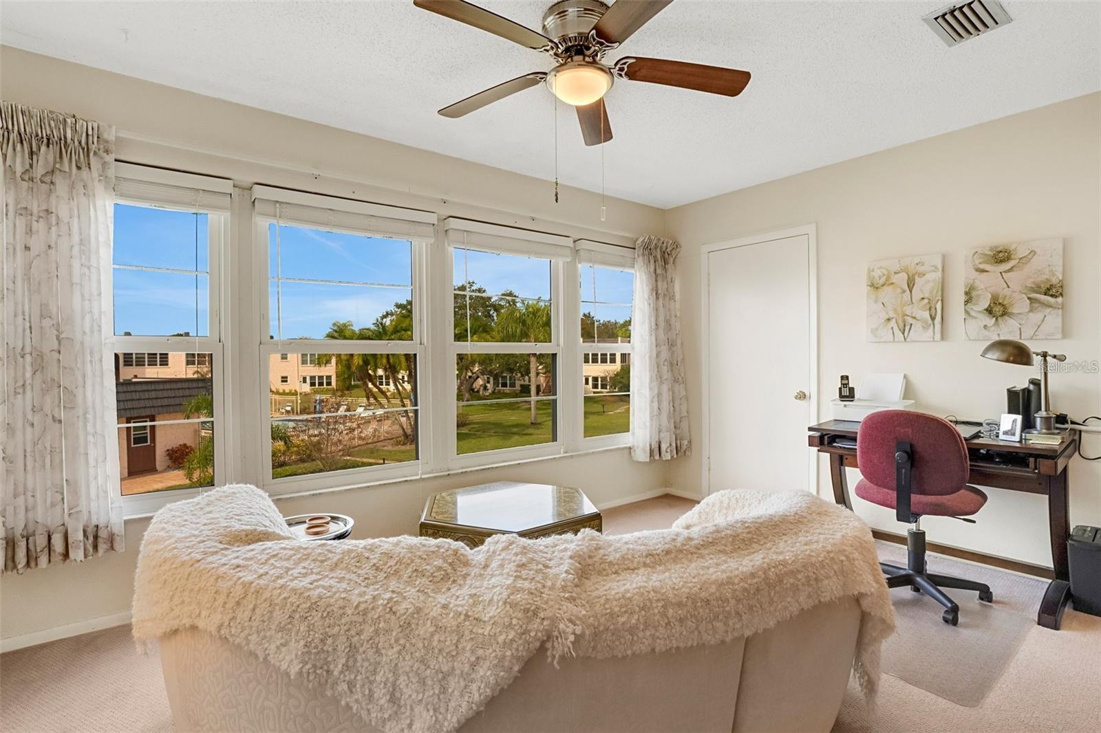 Florida Room with Pool & clubhouse view