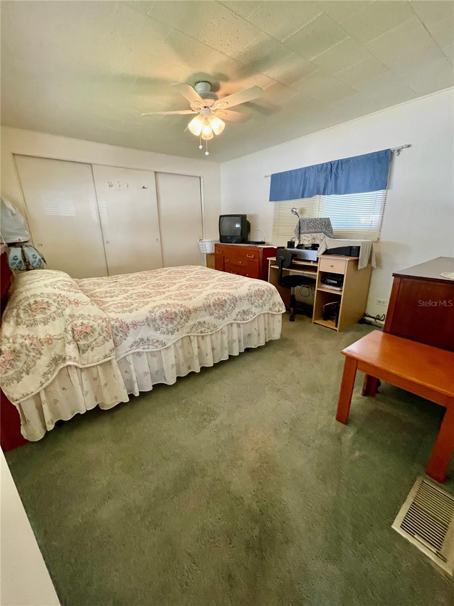 Very spacious bedroom, shown straight ahead is wall to wall closets