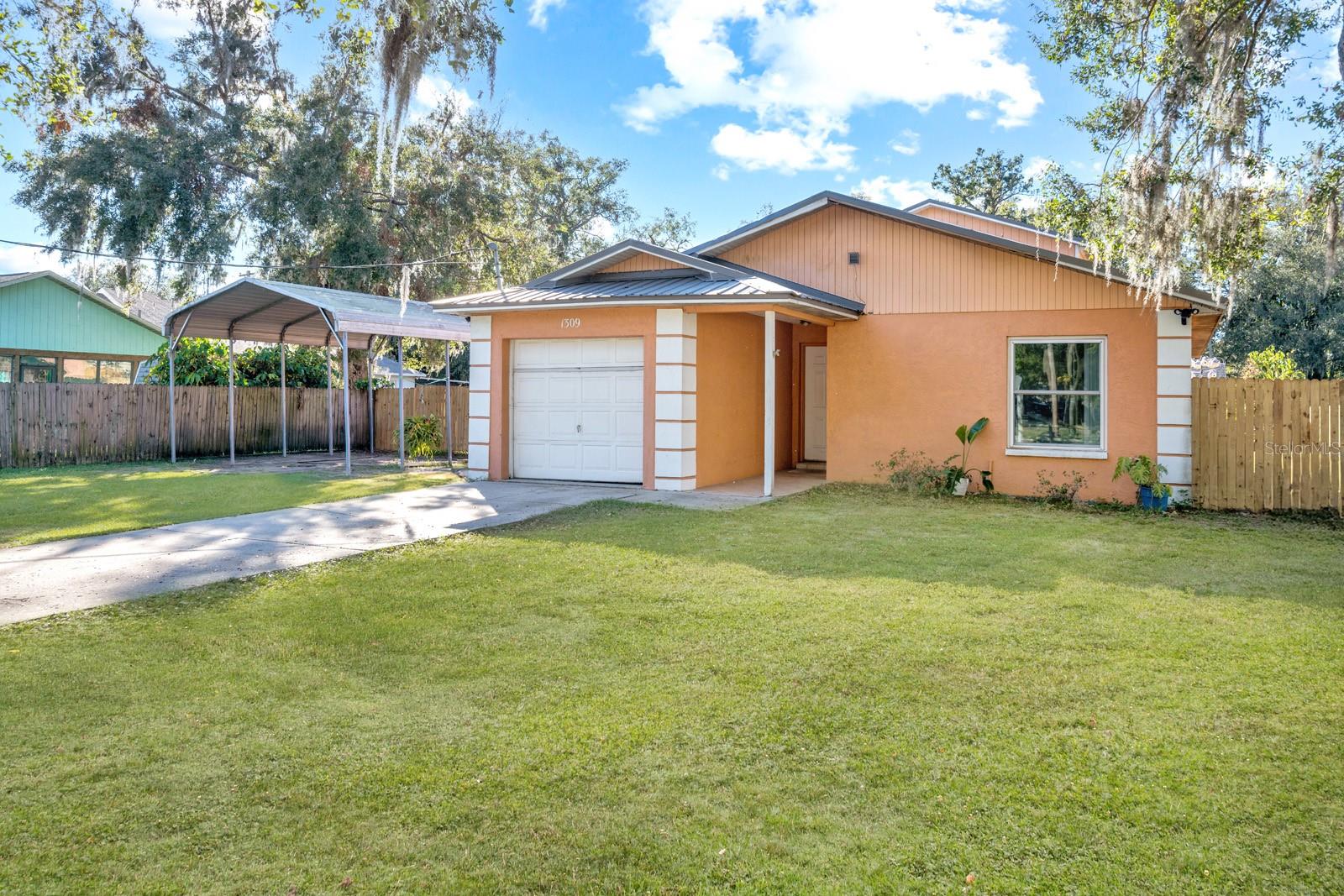 Don't Be Mislead by the Size of the Front of this House ... Keep Looking Because this 1828 sqft Home is Long and Tall in Back !