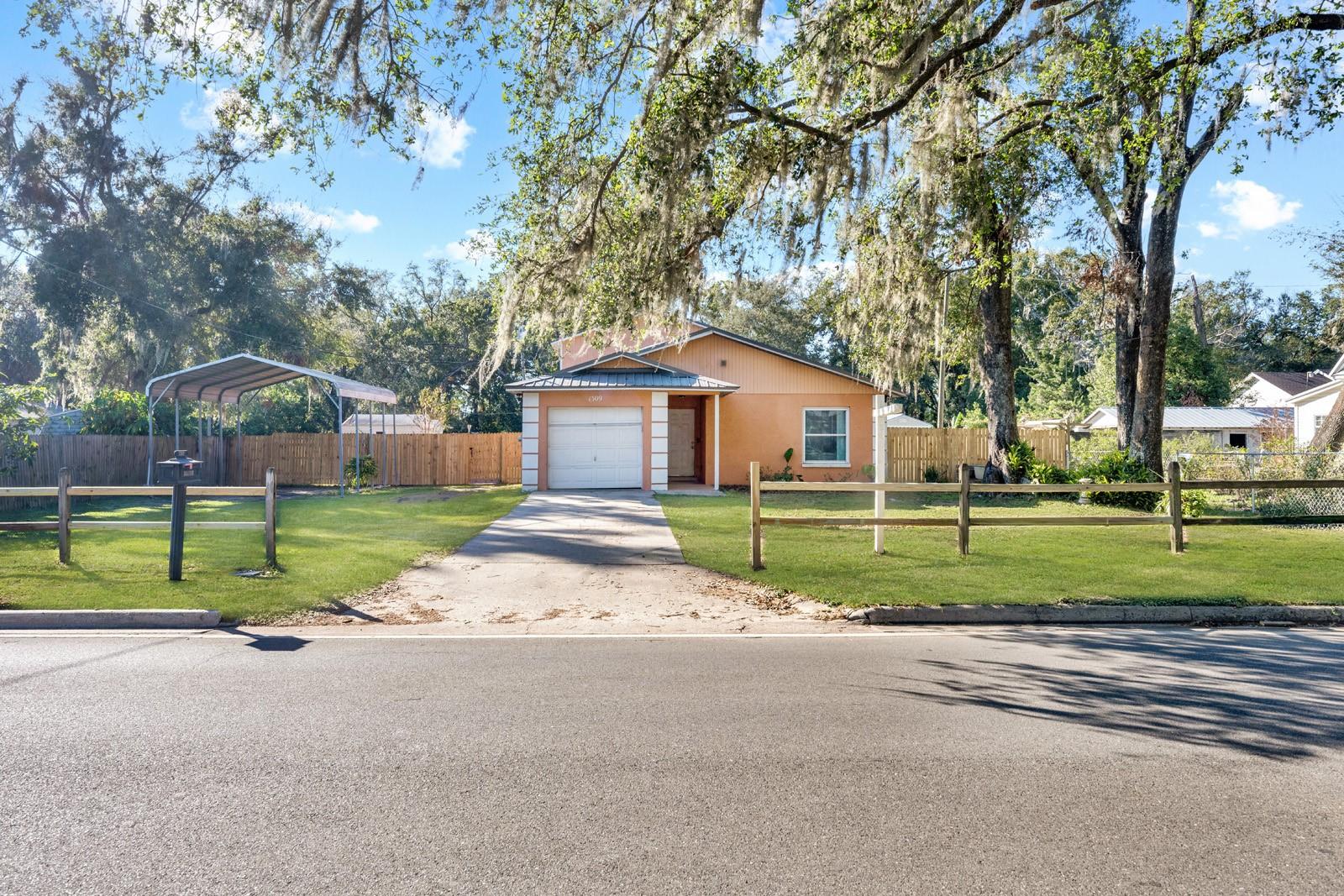 An Abundance of Land with an 18X20 Covered Carport