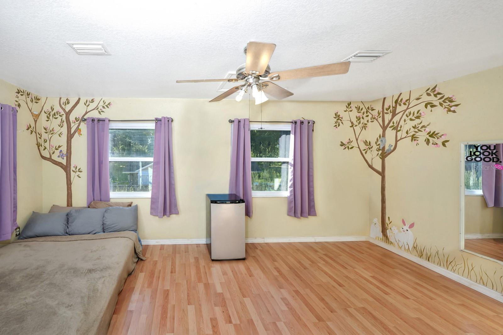 18X11 Wood Laminate Flooring with a Walk-in Closet. Lots of Natural Light !