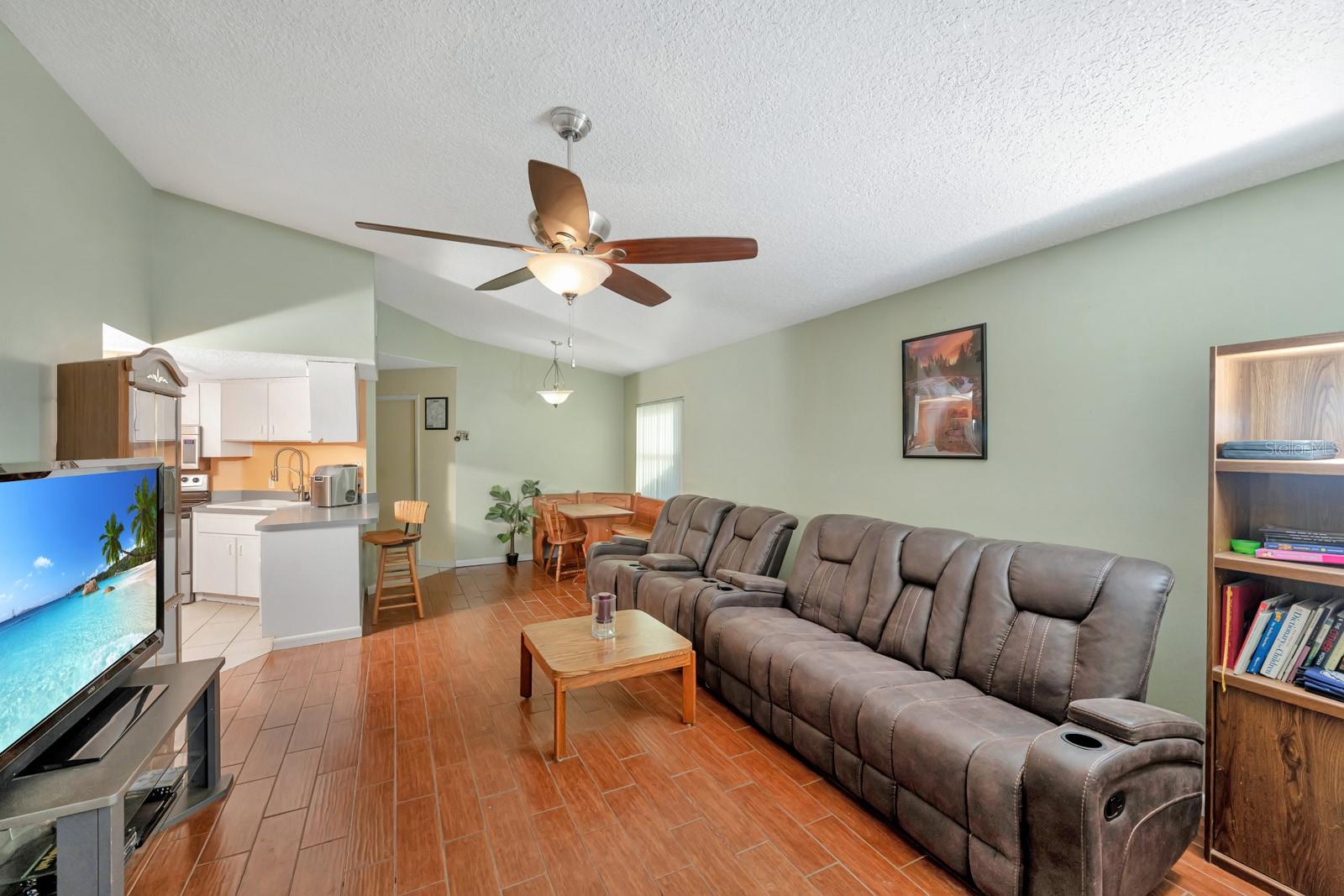 Ceramic Tile Planks Throughout the Main Living Area.