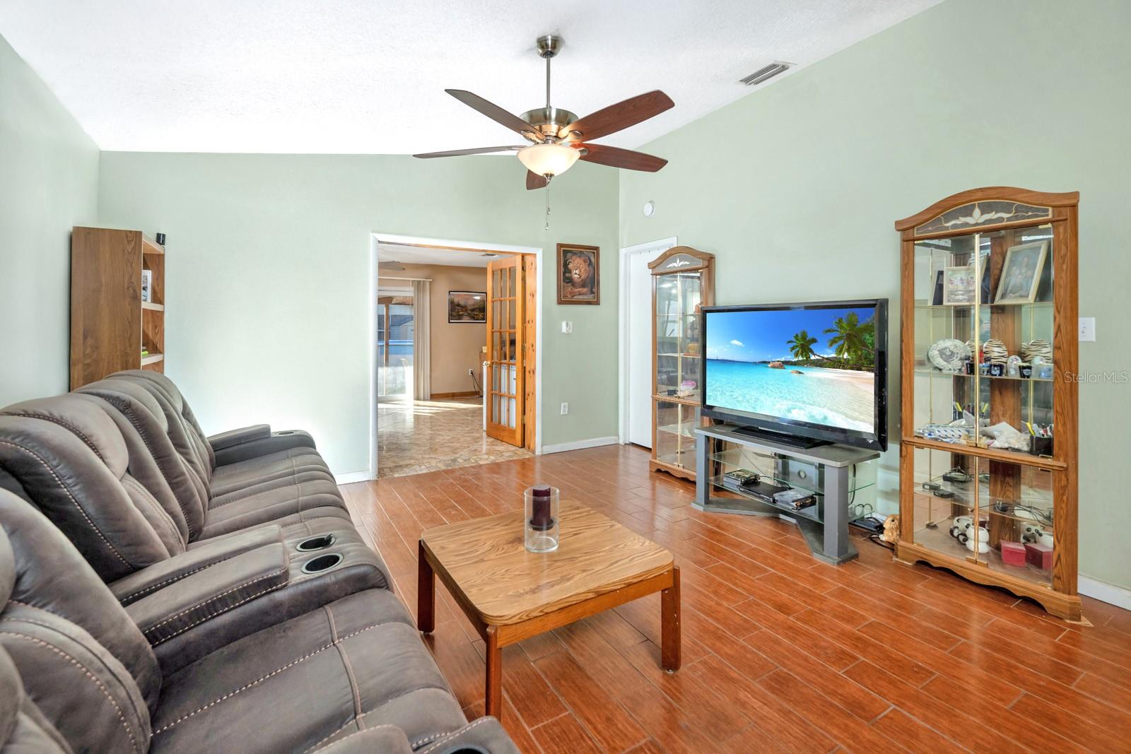 Double Glass Doors Leading out to the Large 15X25 Bonus Room.