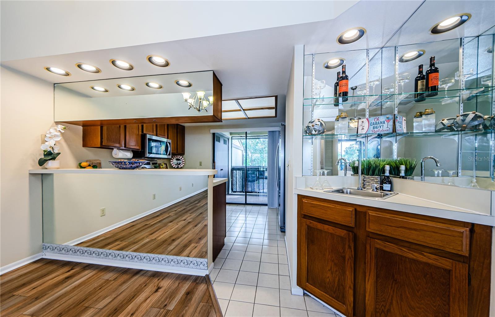 Bar stool countertop near the wet bar for your impromptu gatherings.