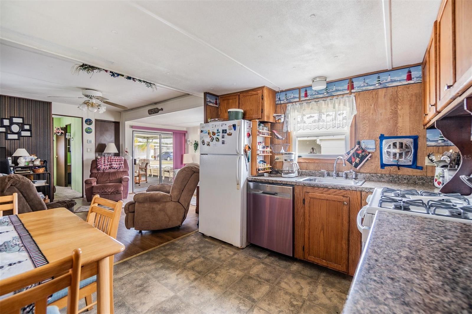 Open kitchen with living room on this three-bedroom home.