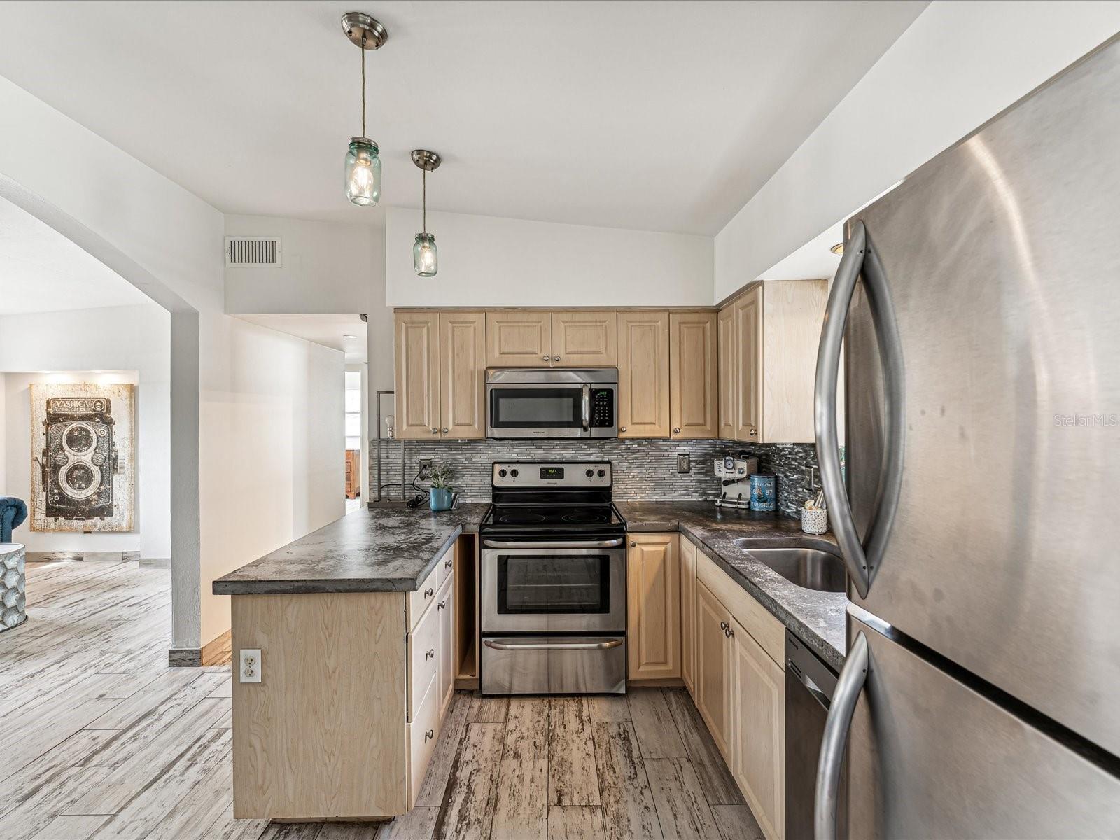 Kitchen w/ Custom Concrete Countertops