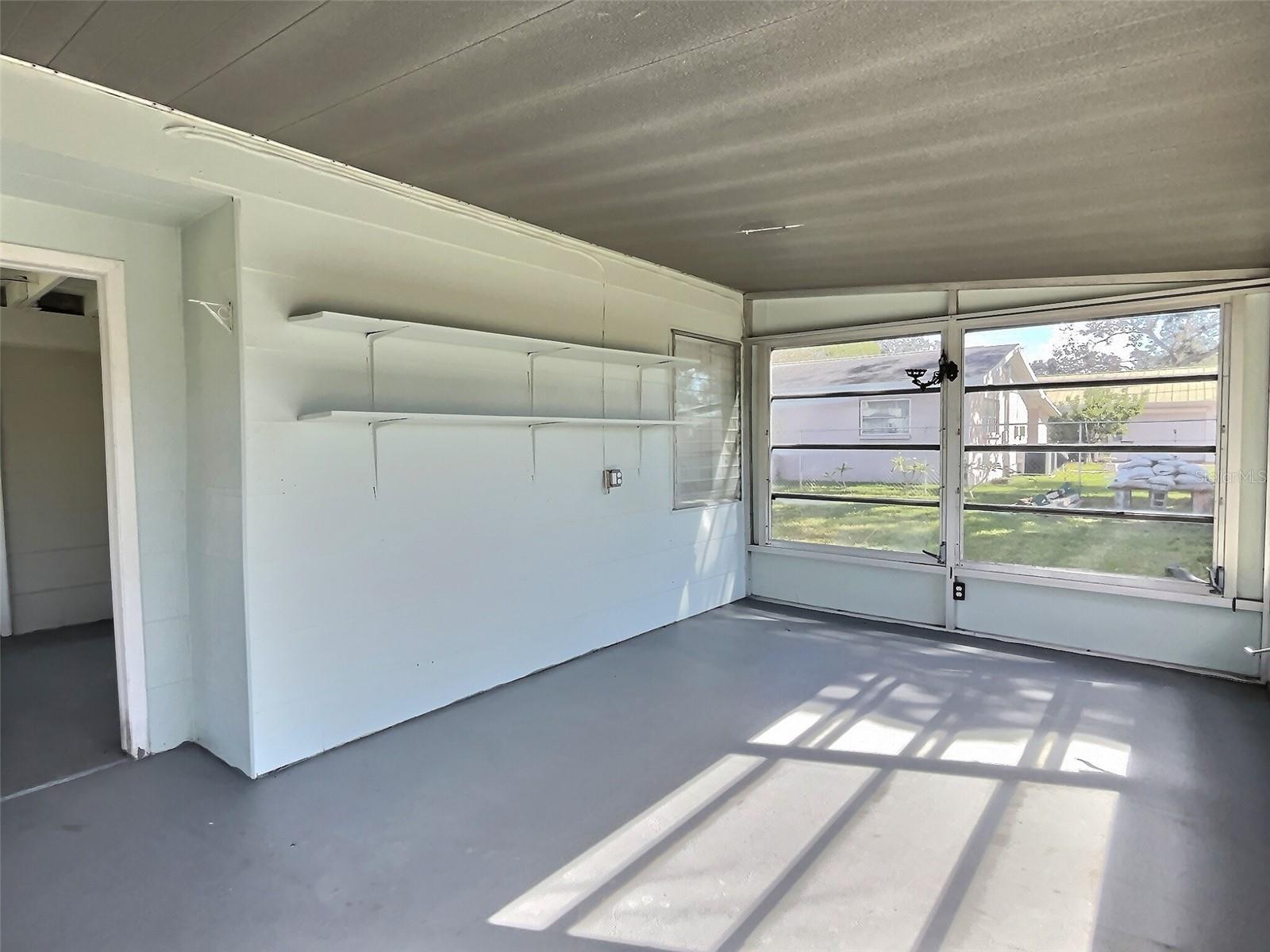 Sunny rear porch room