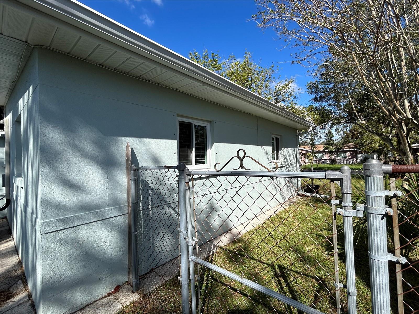 Side yard, looking toward the front