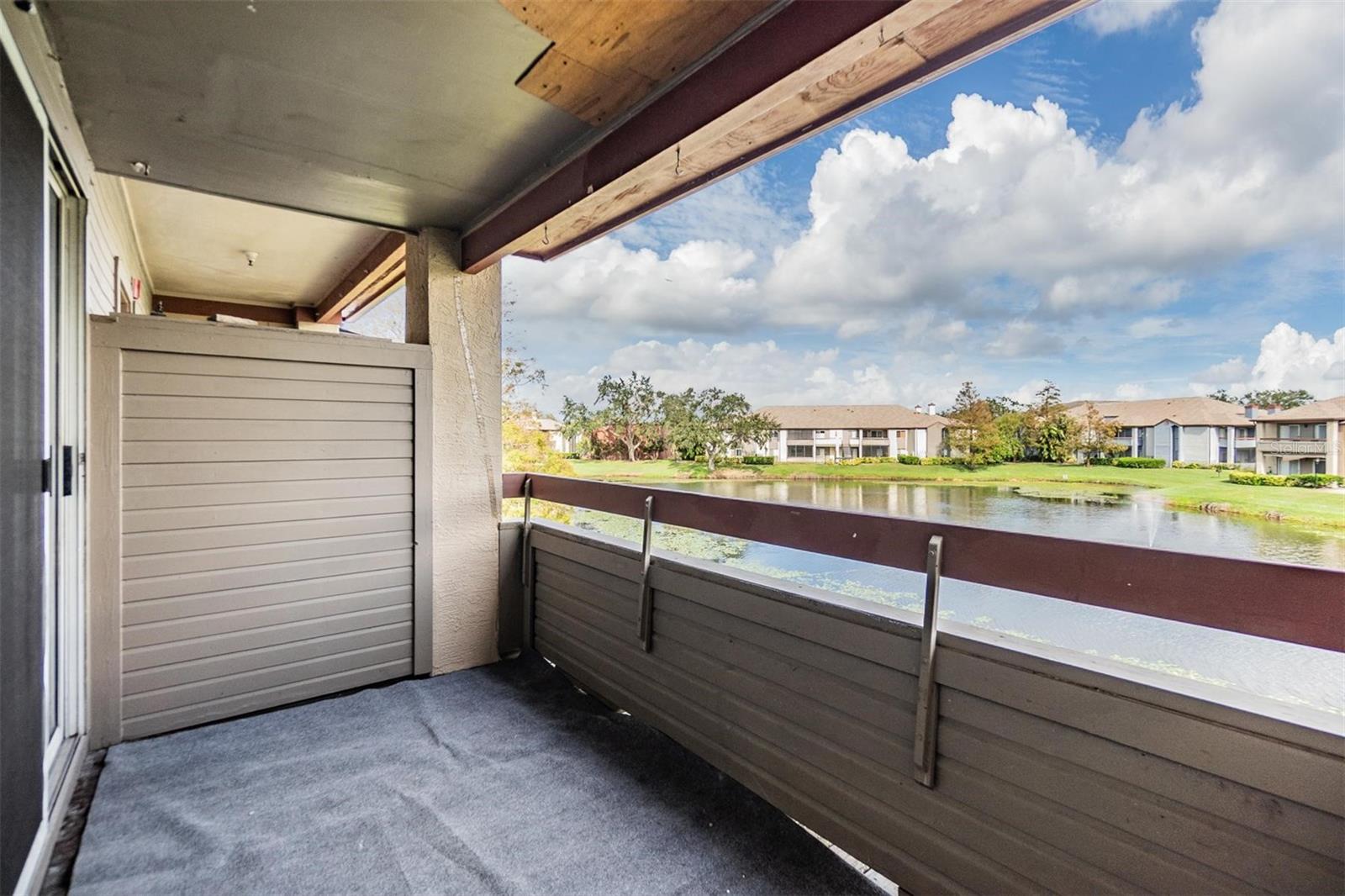 Balcony with peaceful pond views