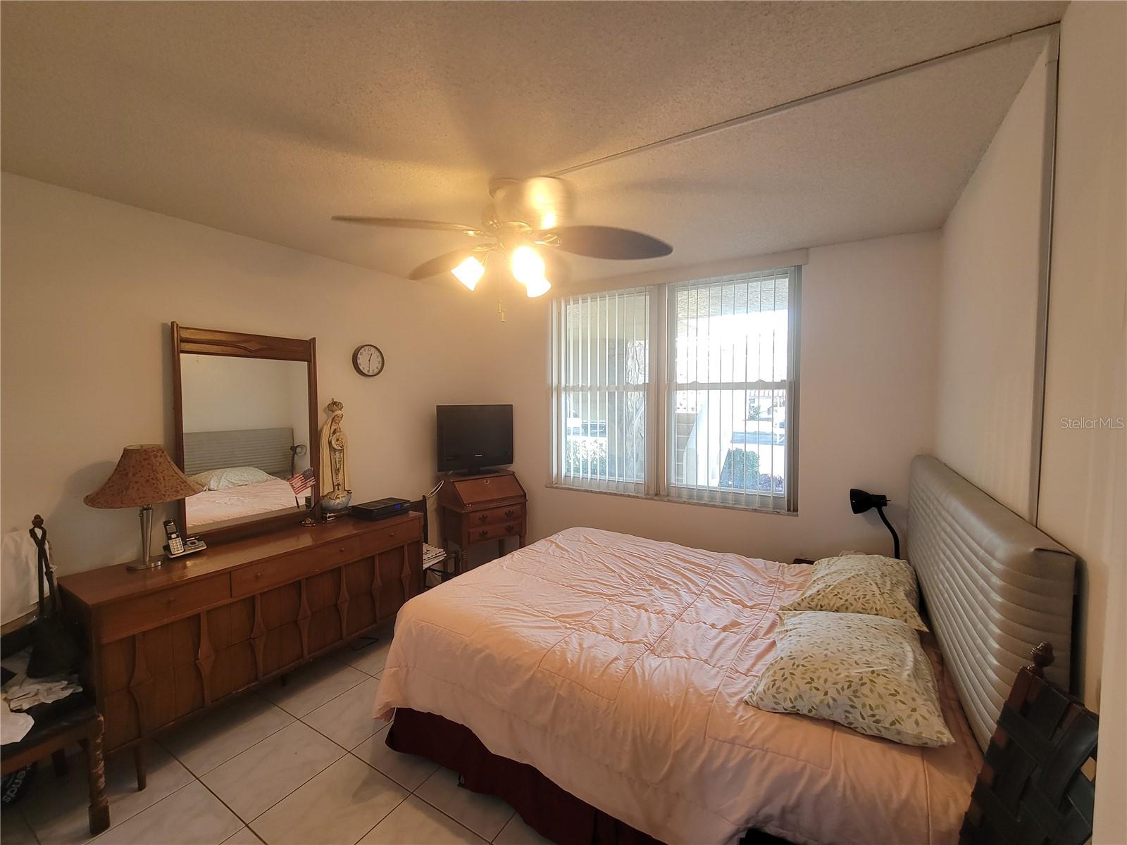 Second bedroom facing front of unit