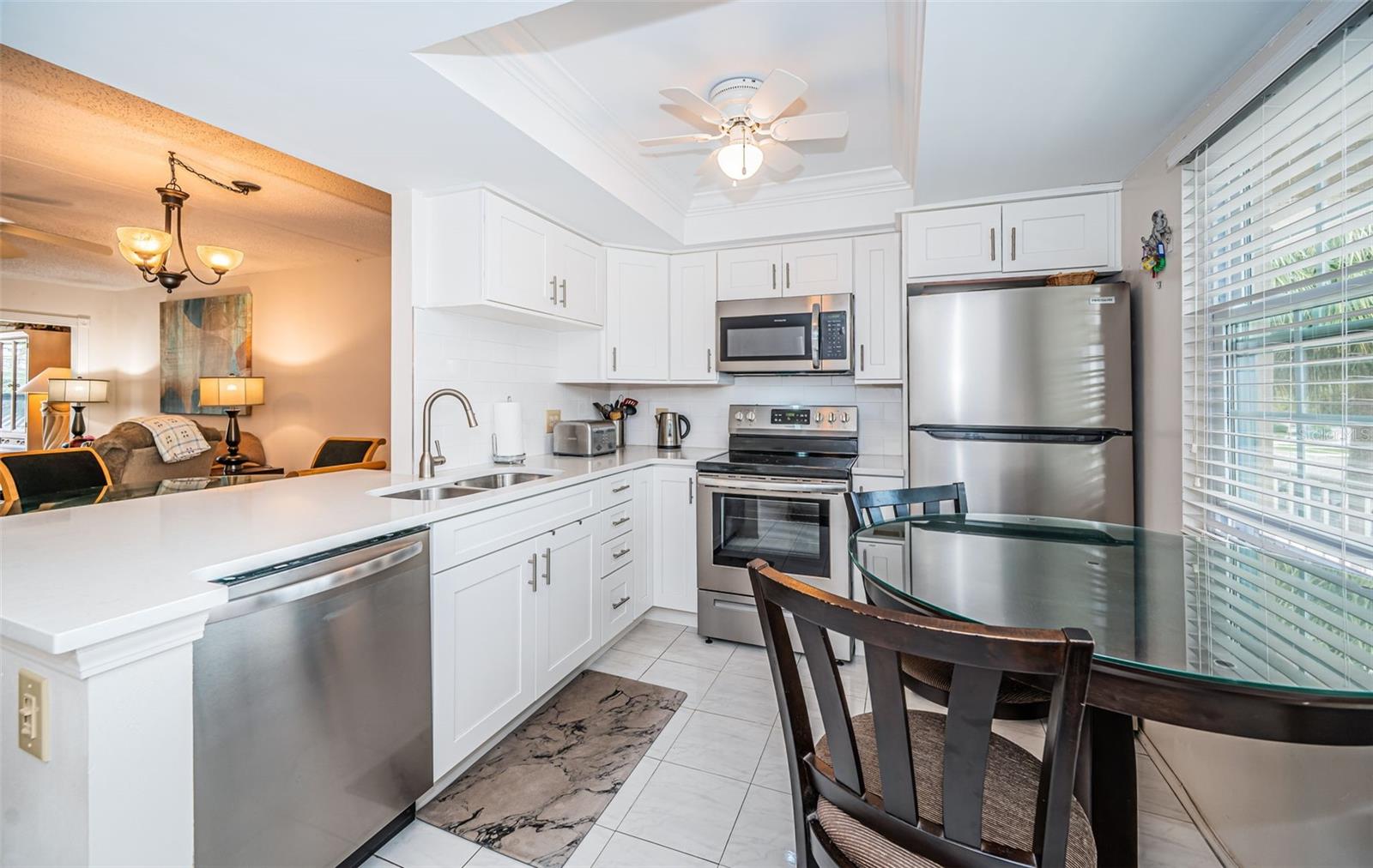 Check it out!  This condo has a dishwasher and a built in microwave, not common in other units.