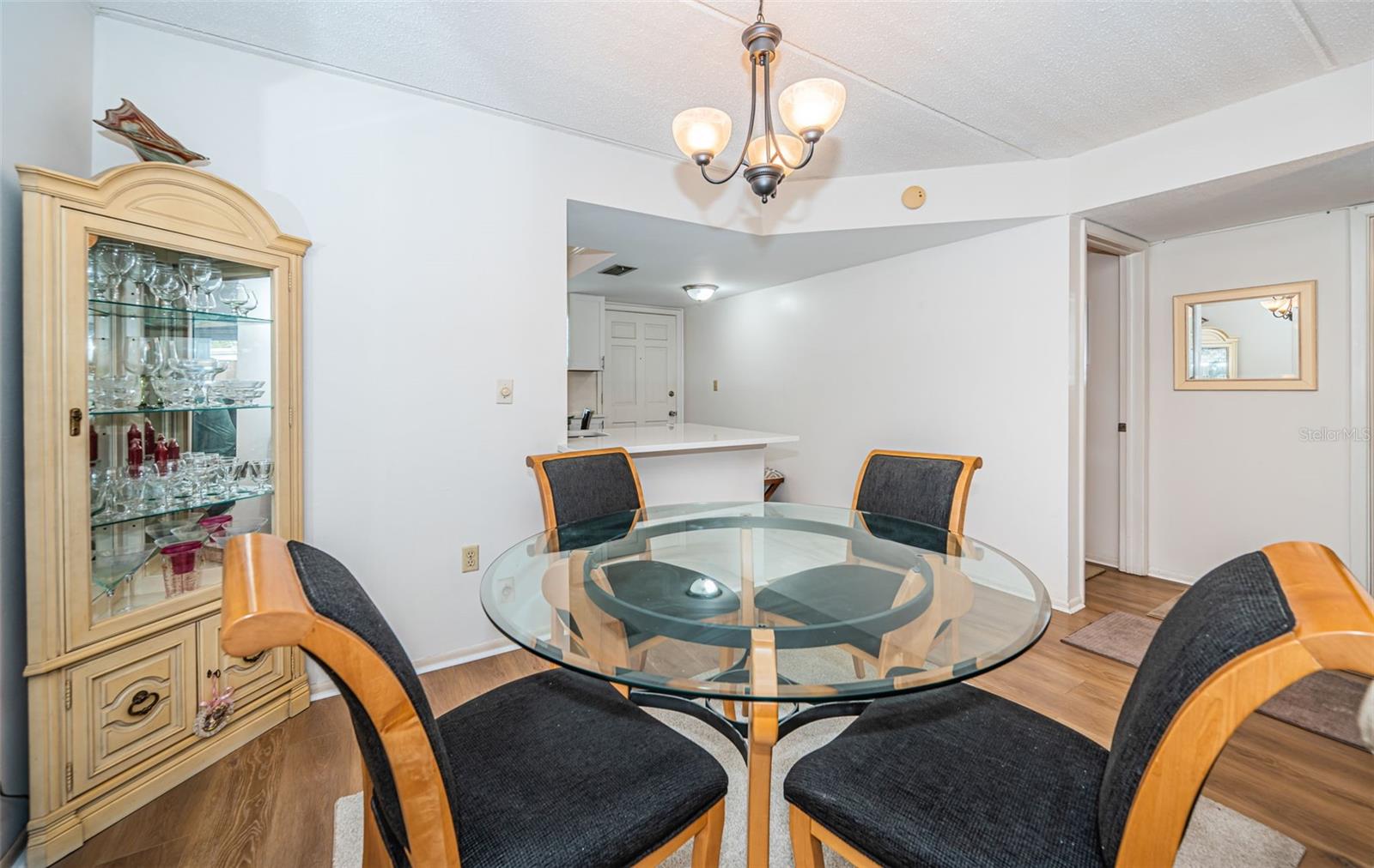 View from Dining area to kitchen and front second bedroom