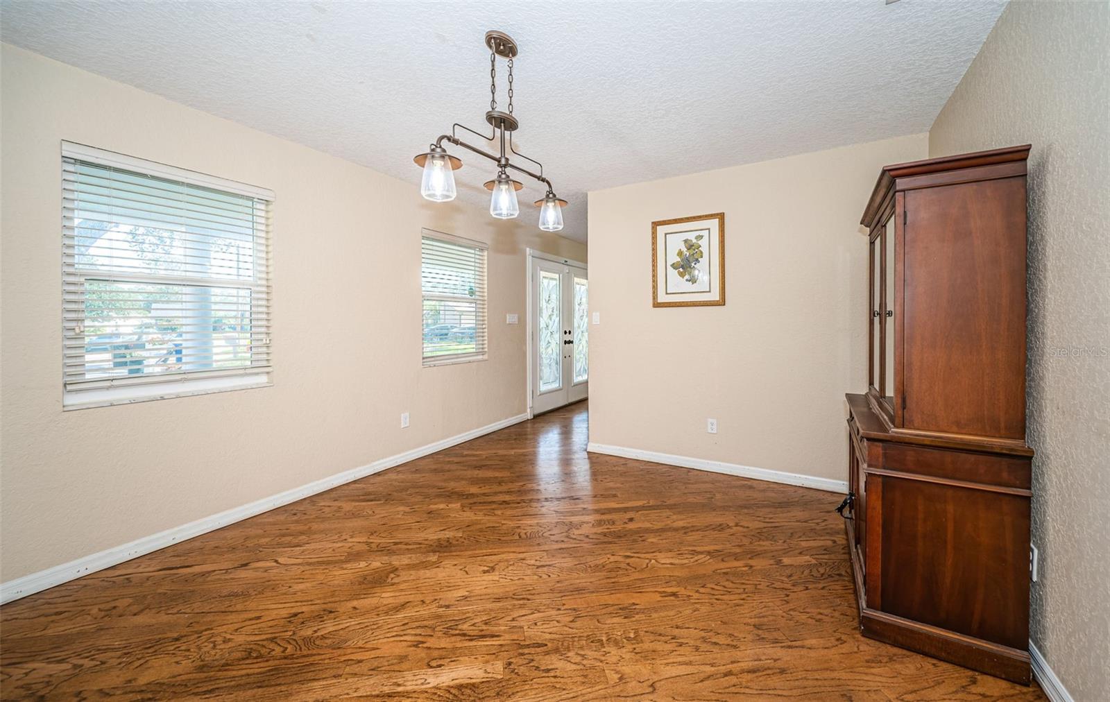 Dining room accessible from entry and kitchen.