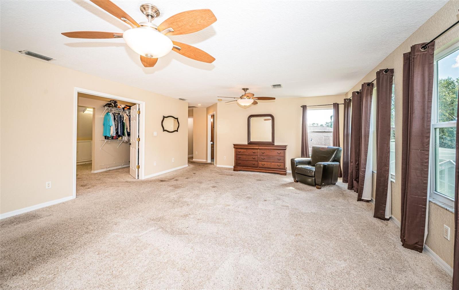 Double doors leading to equally large closet.