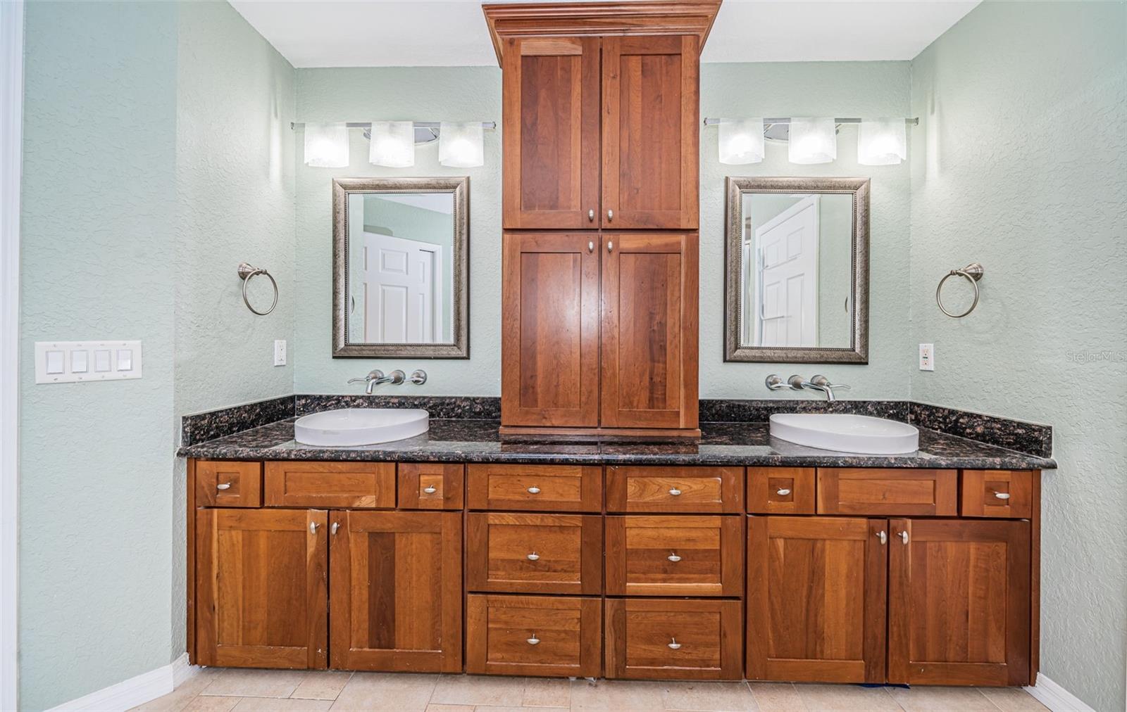 Double sinks with ample storage.