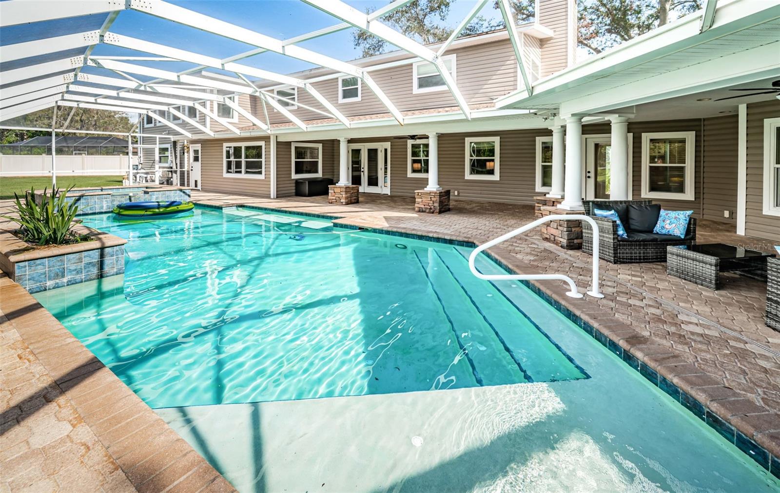 Pool deck and screen recently pressure cleaned.