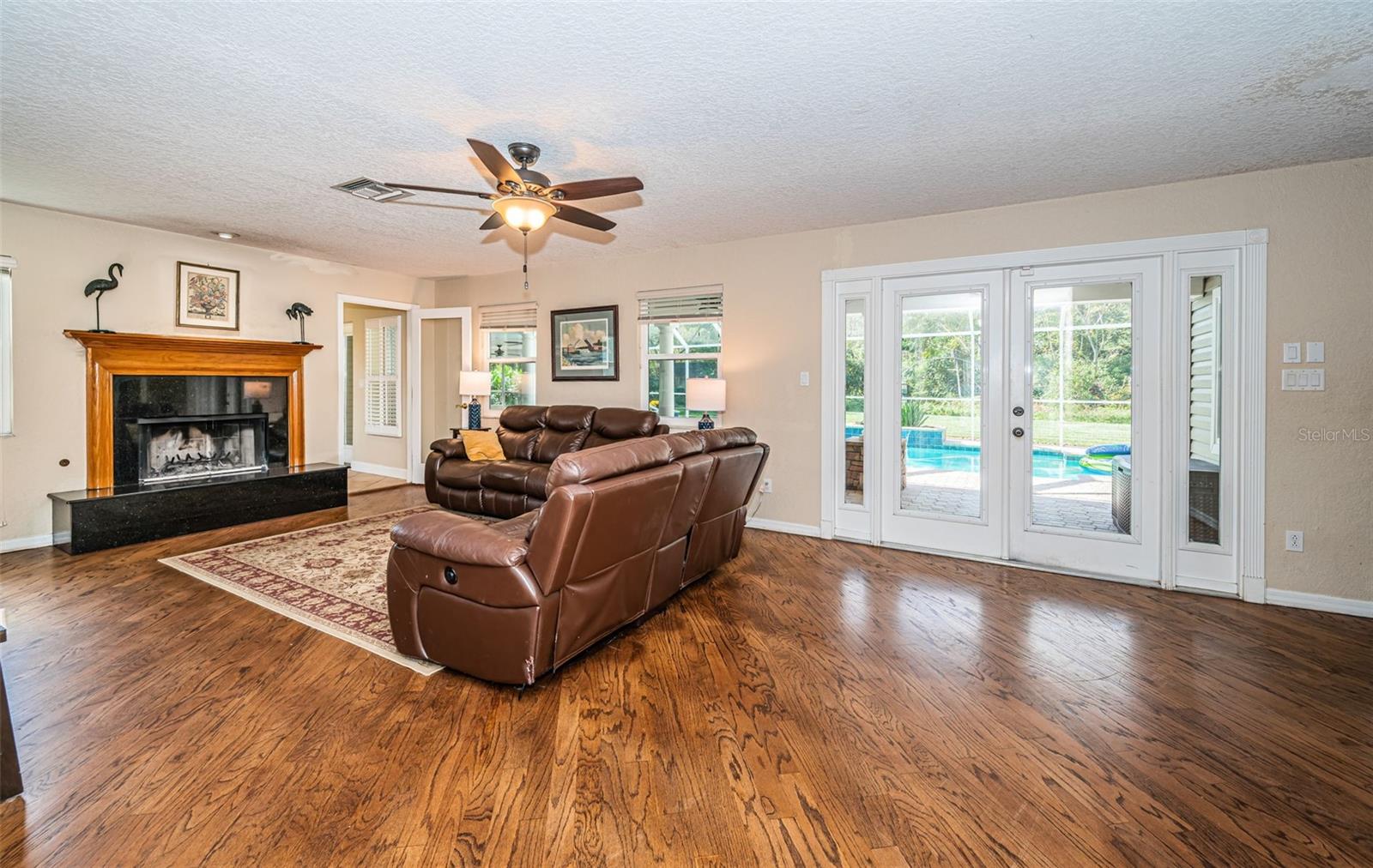 Solid wood flooring on main level.