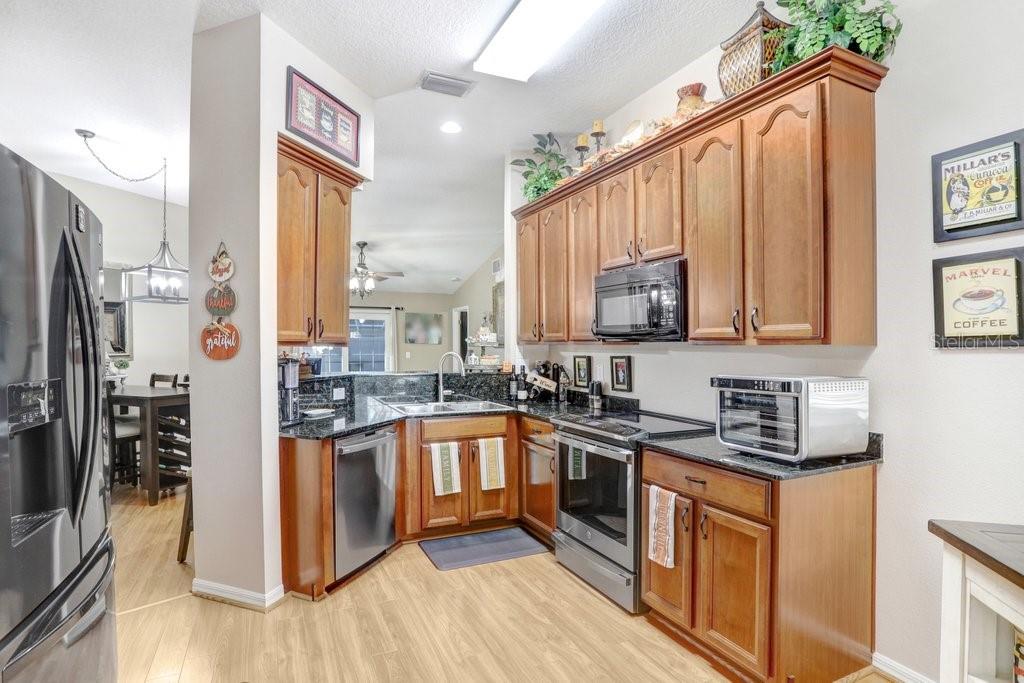 Kitchen with granite counters and 42" cabinets