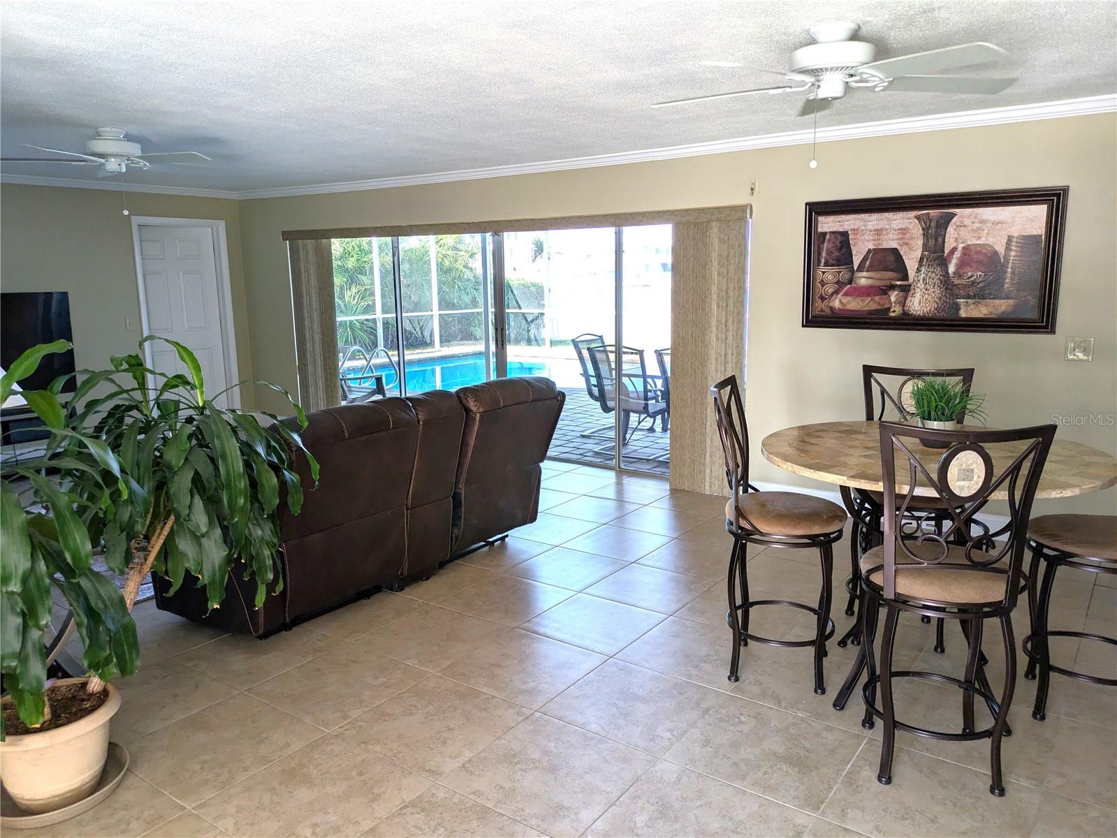 Living room with sliders to pool