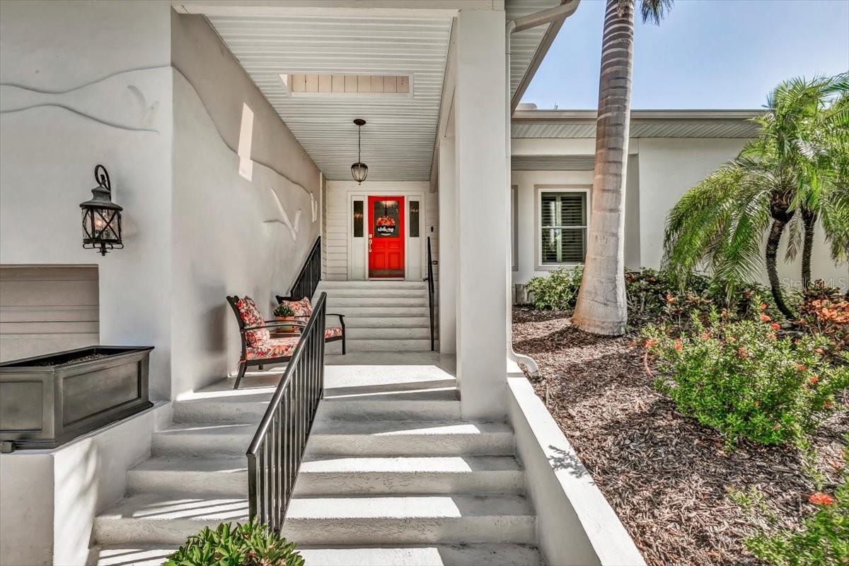 The enclosed porch area is not only for enjoying the view, it's the entrance to a perfect escape.