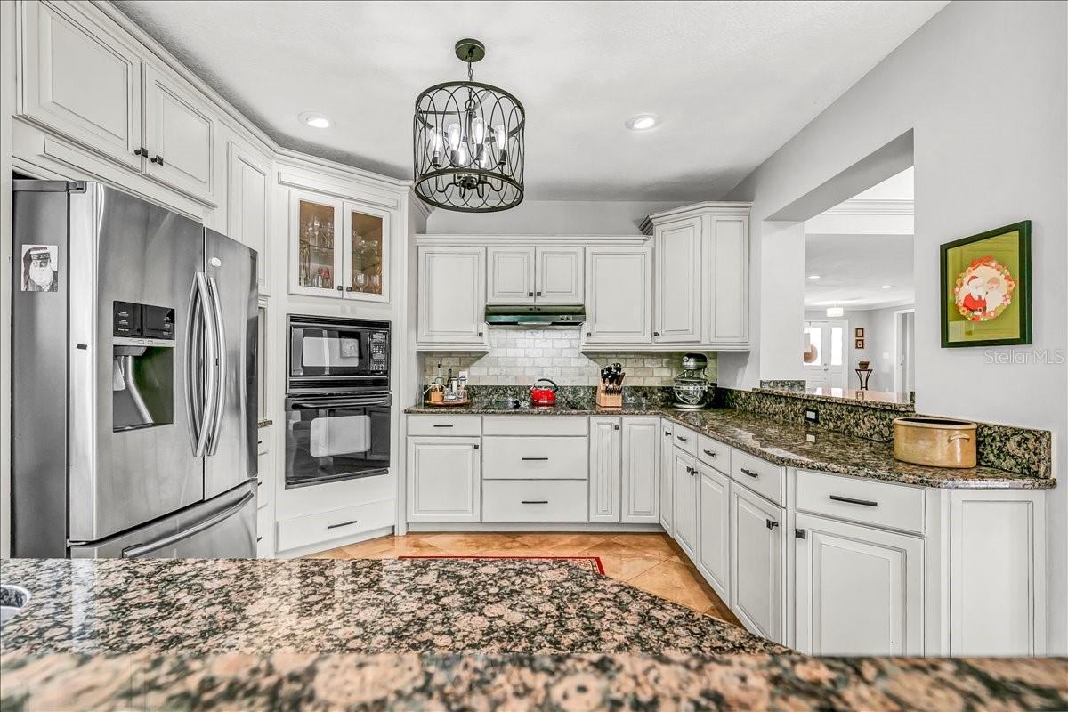 Ample counter space near the cooktop and range hood is a chef's dream.