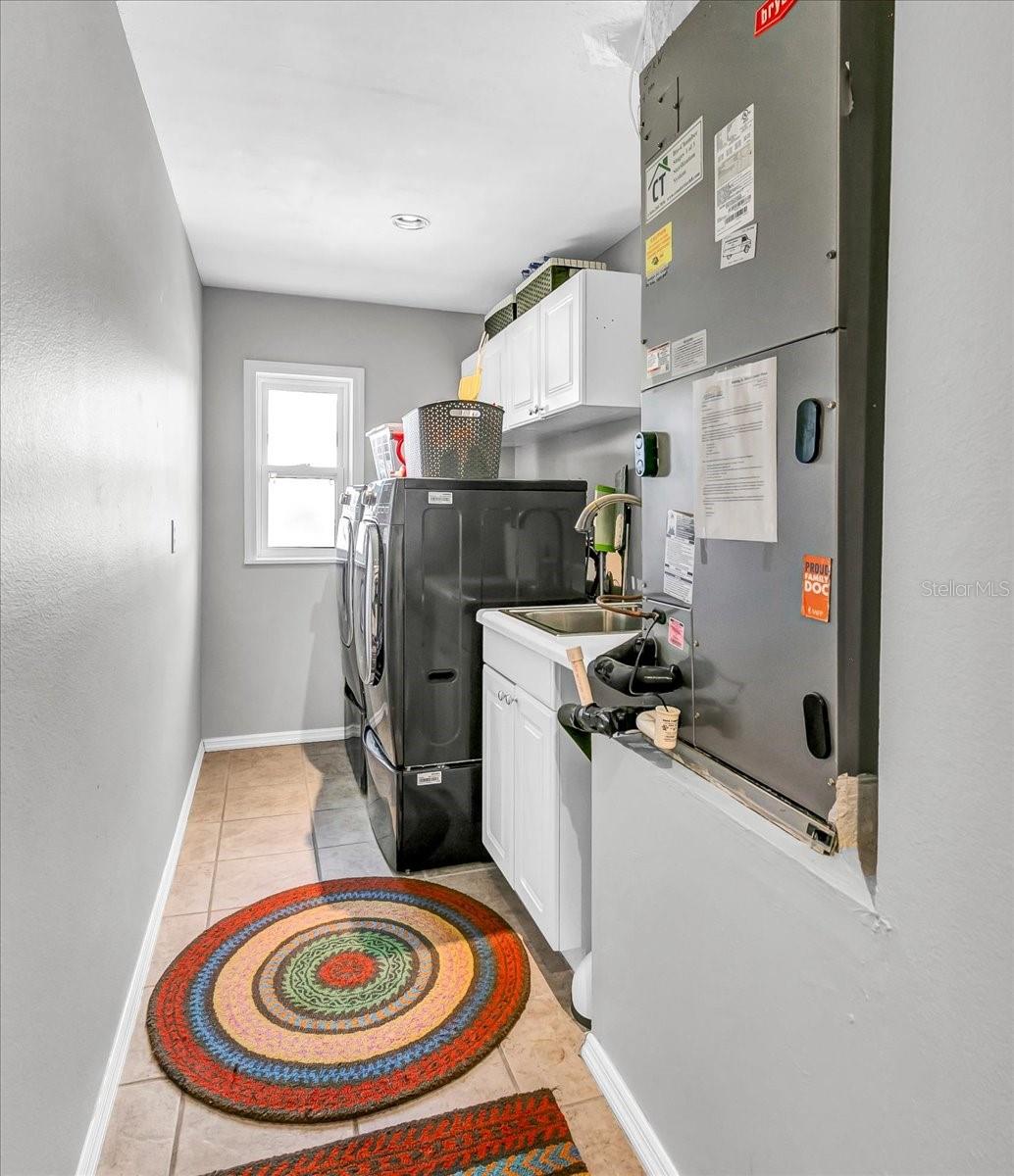 A convenient oversized laundry room is just off the main living area.