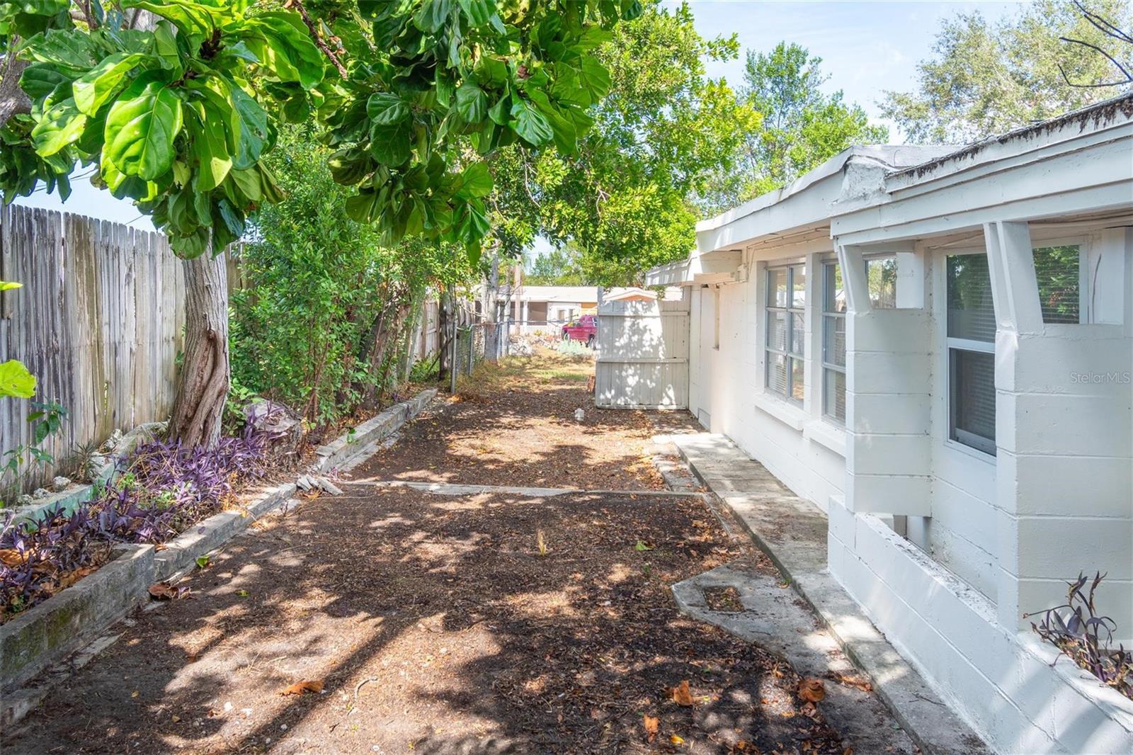 From road along the side of the house to the back