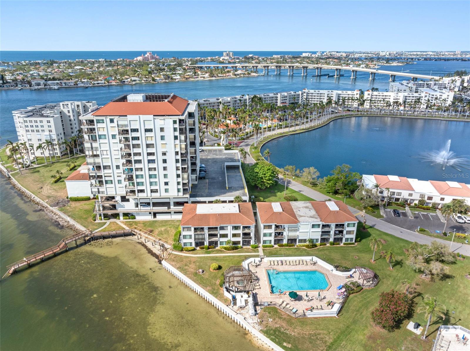 Your private resort awaits—heated pool and spa with panoramic bay views.