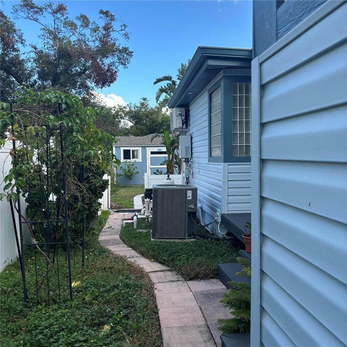 SIDE YARD VIEW TO SHED