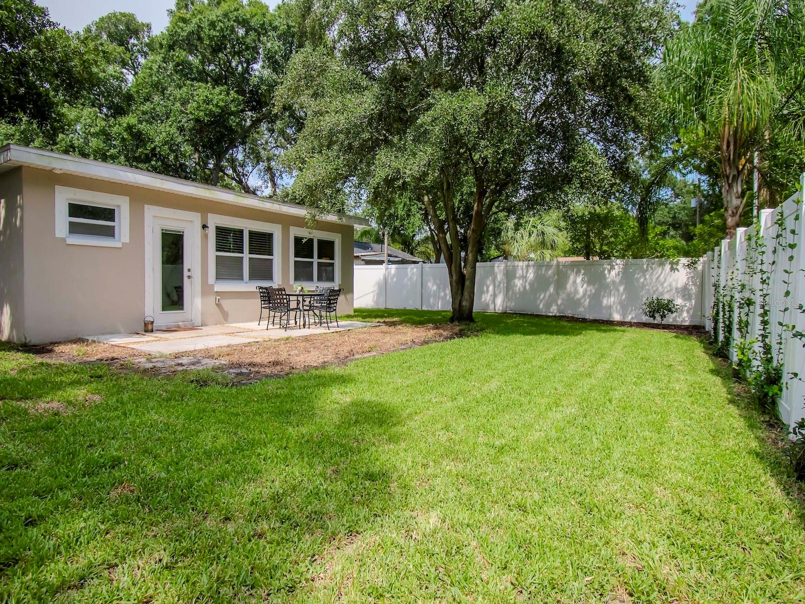 Large & open fenced-in backyard.