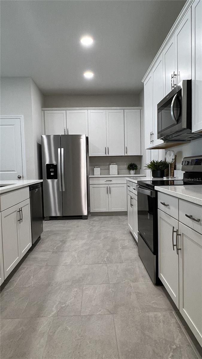 Estero Kitchen with lots of Cabinet Space! (stock photo of model home)