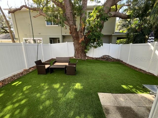 Rear Fenced Yard with Turf