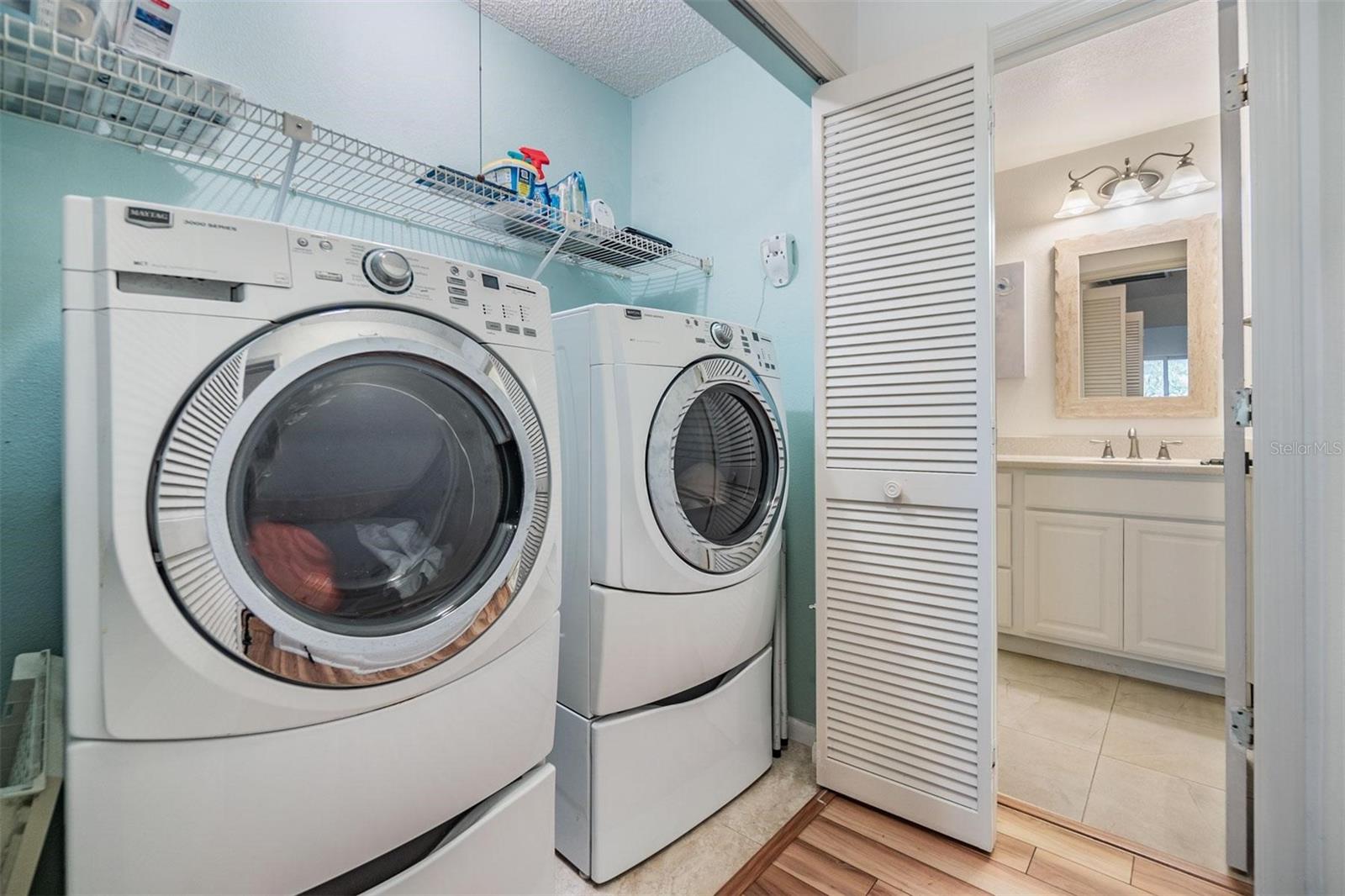 Laundry closet in hallway