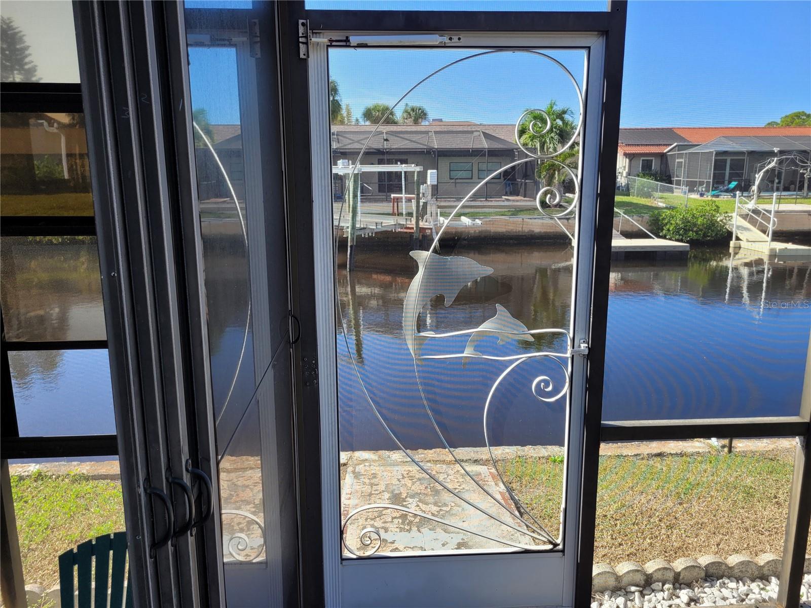 Screen Door To The Canal