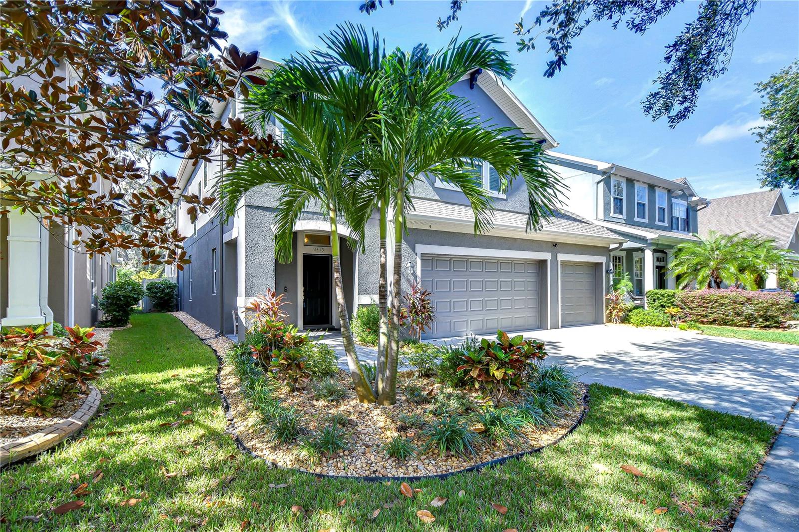 Beautiful curb appeal with well-manicured landscaping and 3 car garage!