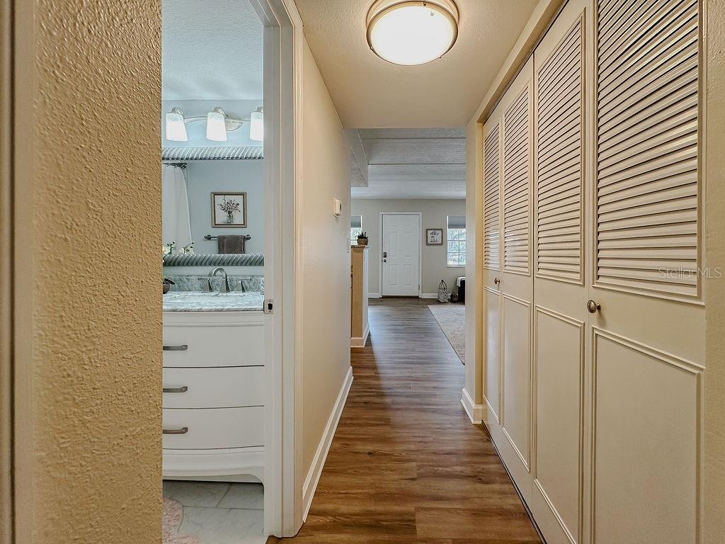 AC in the closet which also has storage shelves