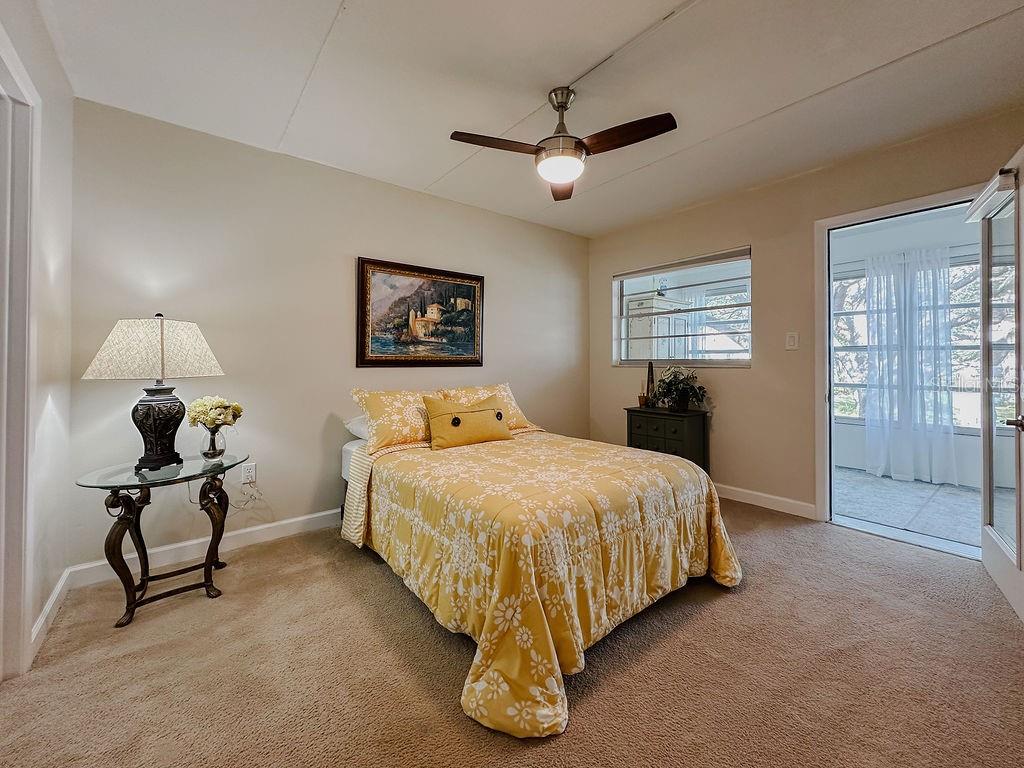 Master bedroom with a patio enterance