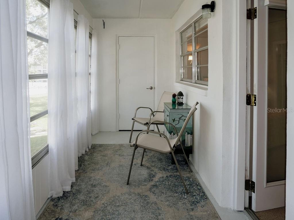 patio with extra storage space behind the door