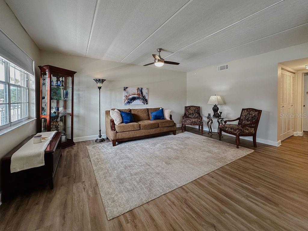 living room with new luxury vinyl flooring