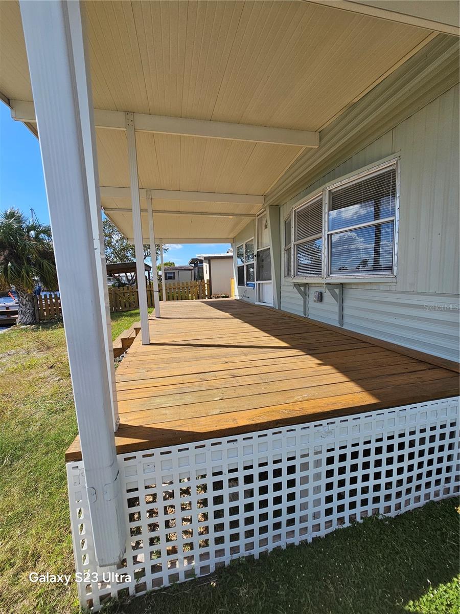 The home features a long porch facing the canal the entire length of the home.