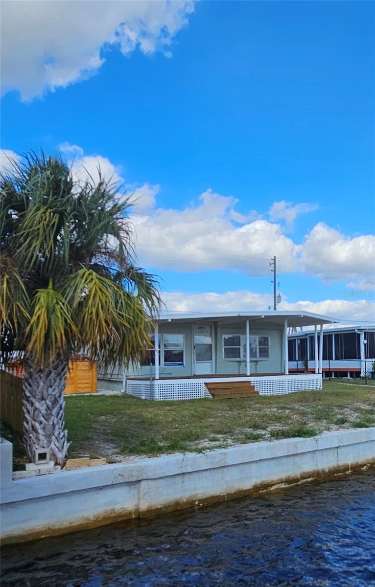 View of lot & sea wall