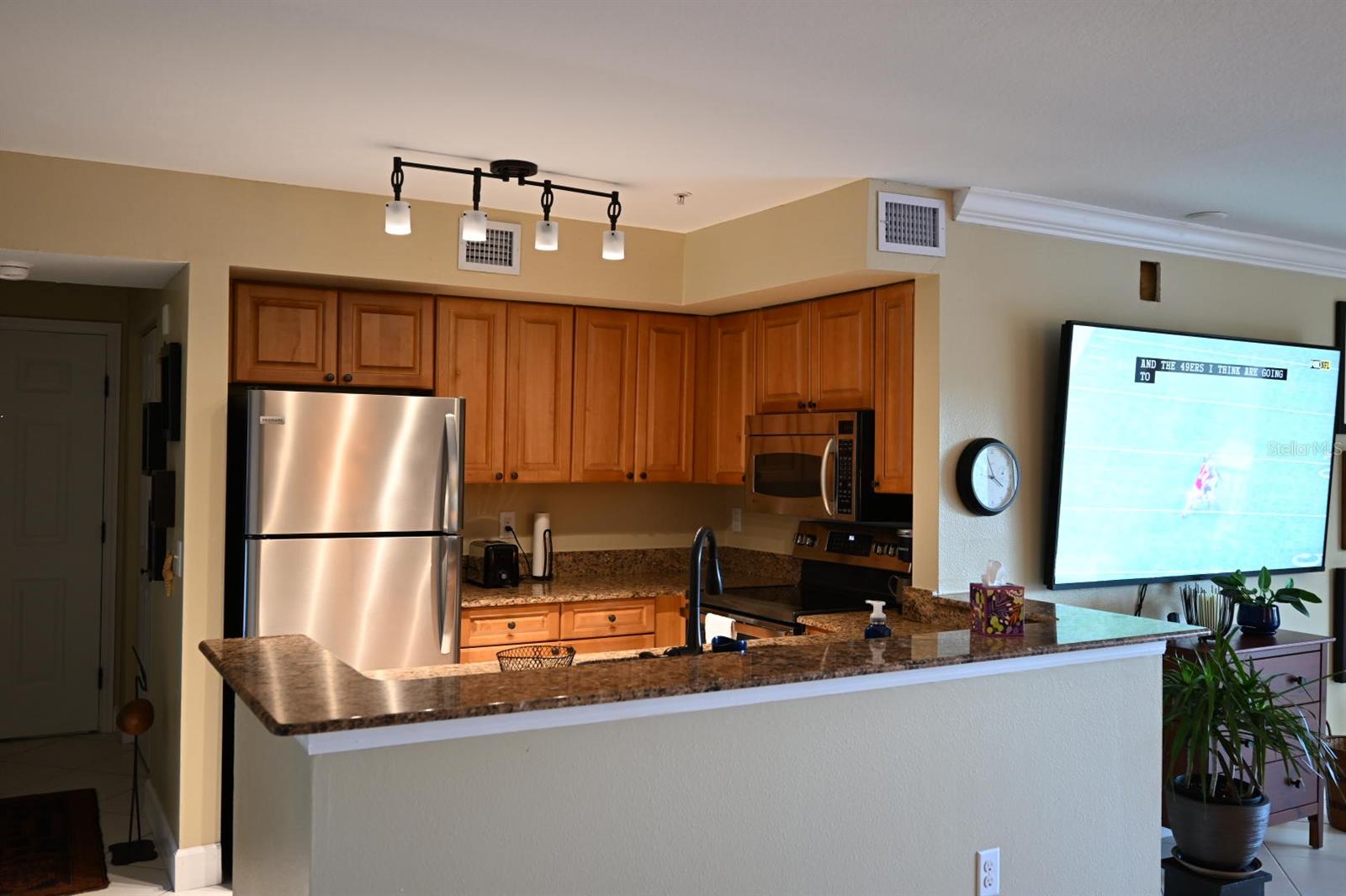 Kitchen with all stainless appliances