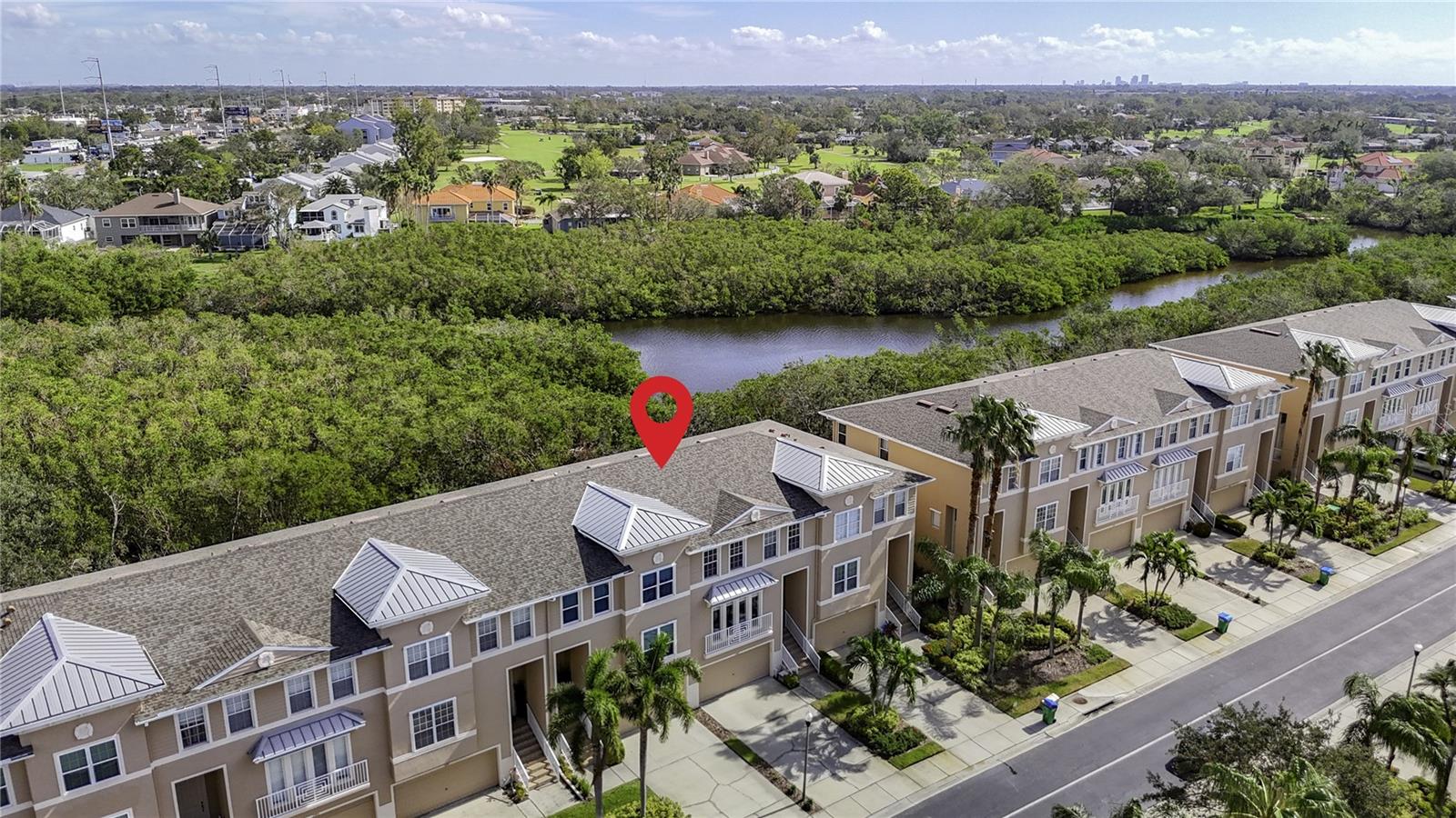 The arrow shows you the great location of this townhome