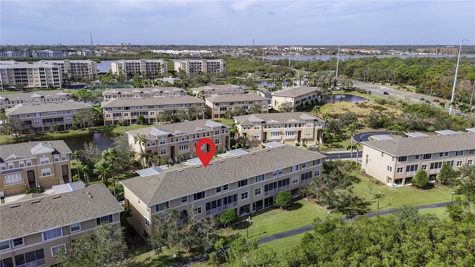 This arrow shows the tranquil setting that you have from your lanai and porch in the back of your townhome