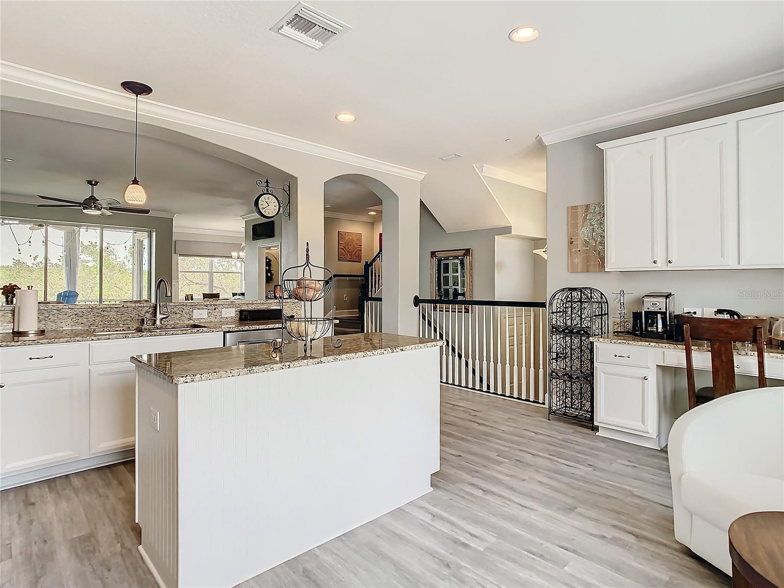 Notice the center island in the kitchen with additional storage