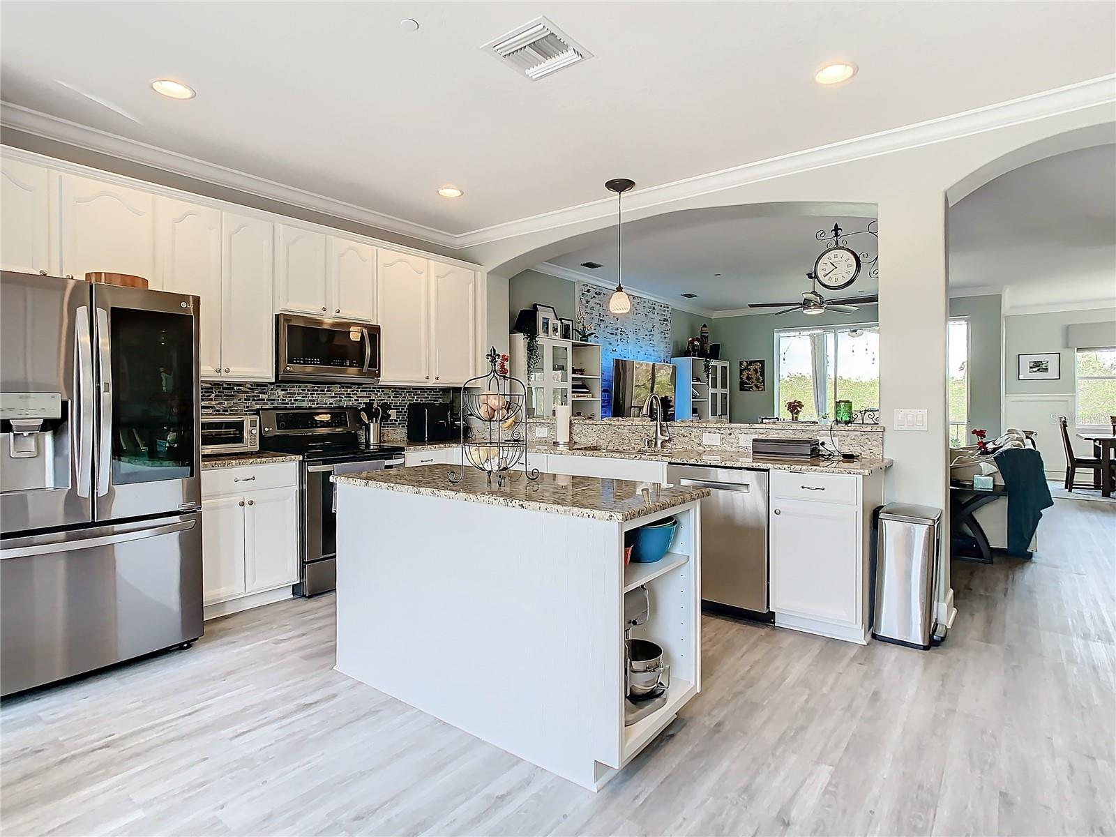 This view lets you see how nice the luxury vinyl flooring looks in the living areas