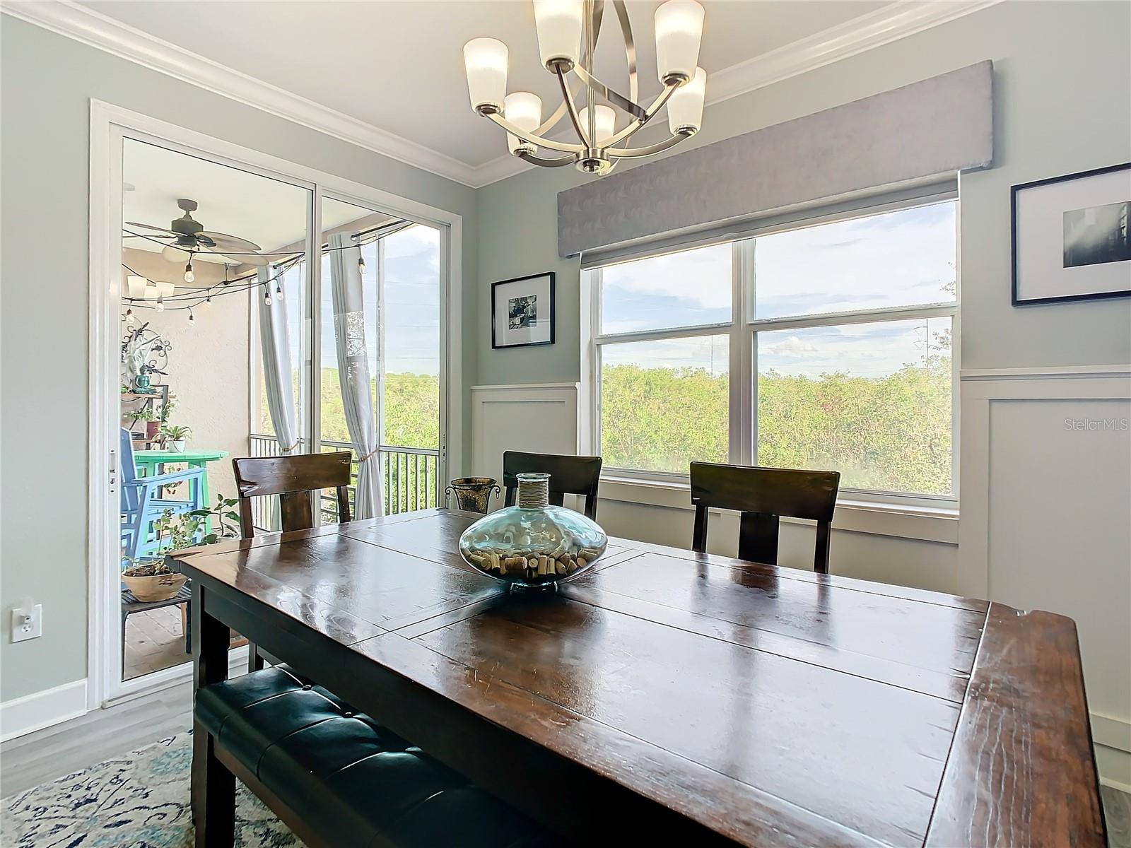 The dining room also has sliders out to the screened-in lanai