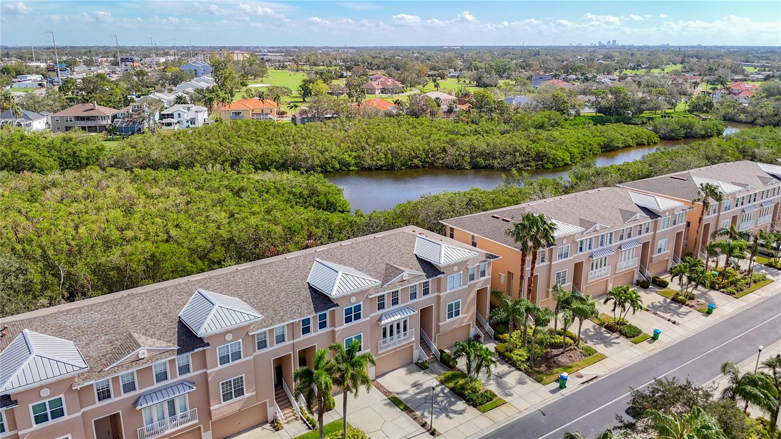 Aerial view of the street where this townhome is located.  Notice it backs up to the bayou.