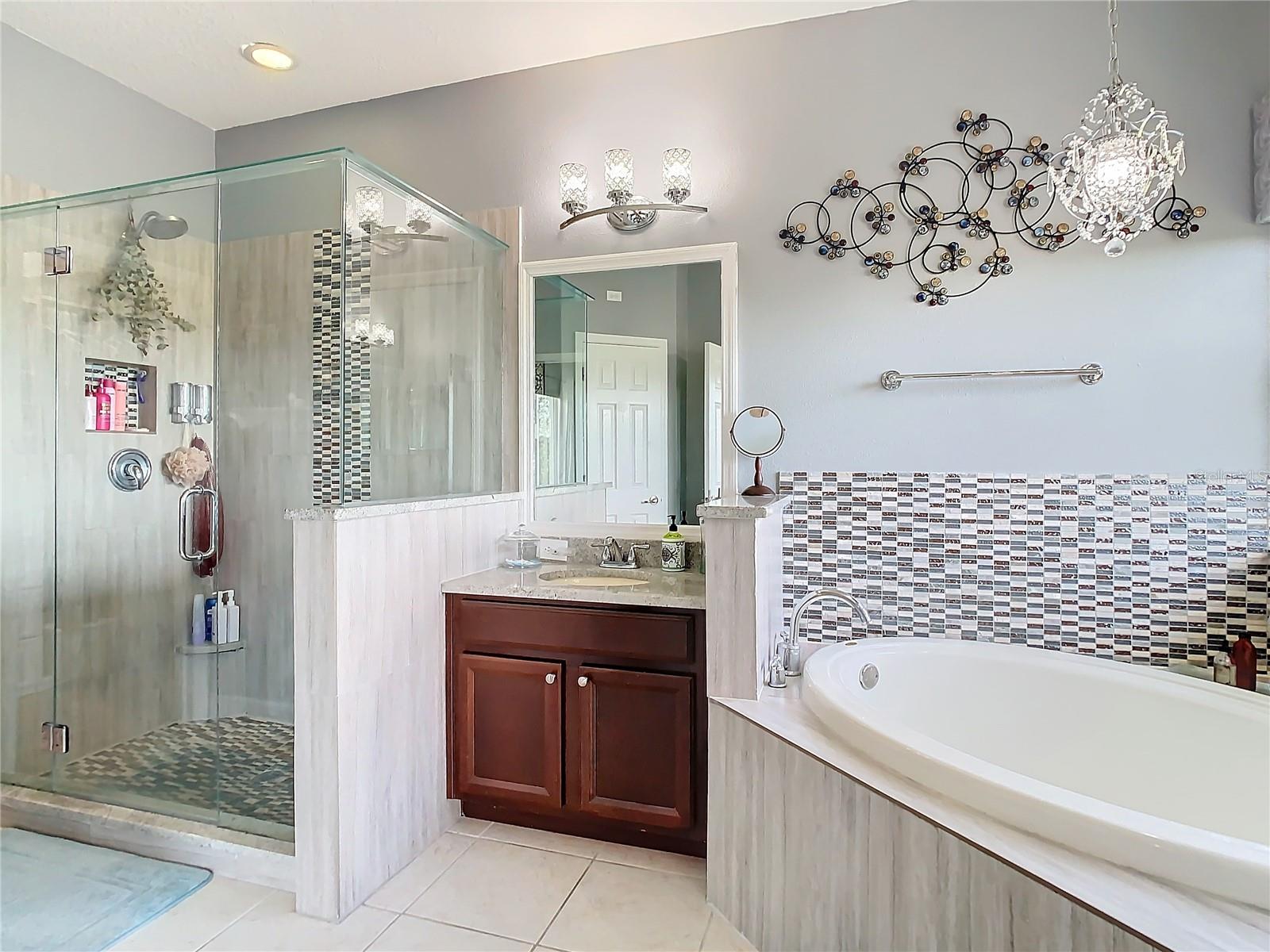 Take a look at how nice the primary bathroom is - separate nice sized shower and tub.  There are 2 separate vanities